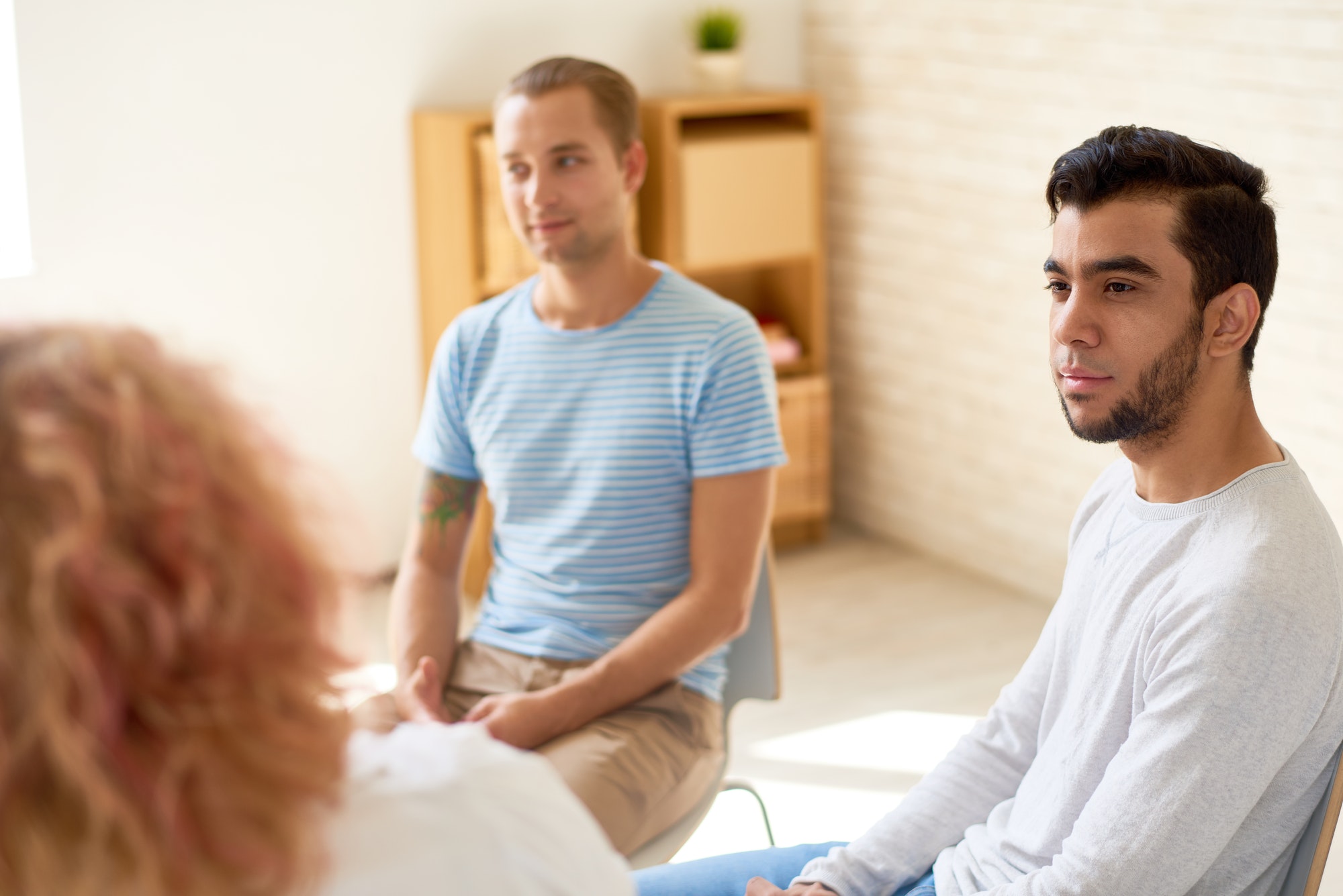 Young Men in Group Therapy Session